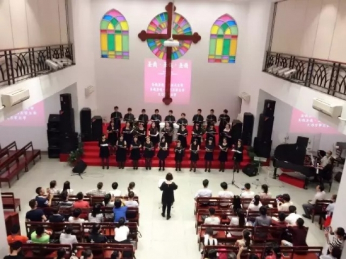 The choir presents a chorus at the Sunday service 