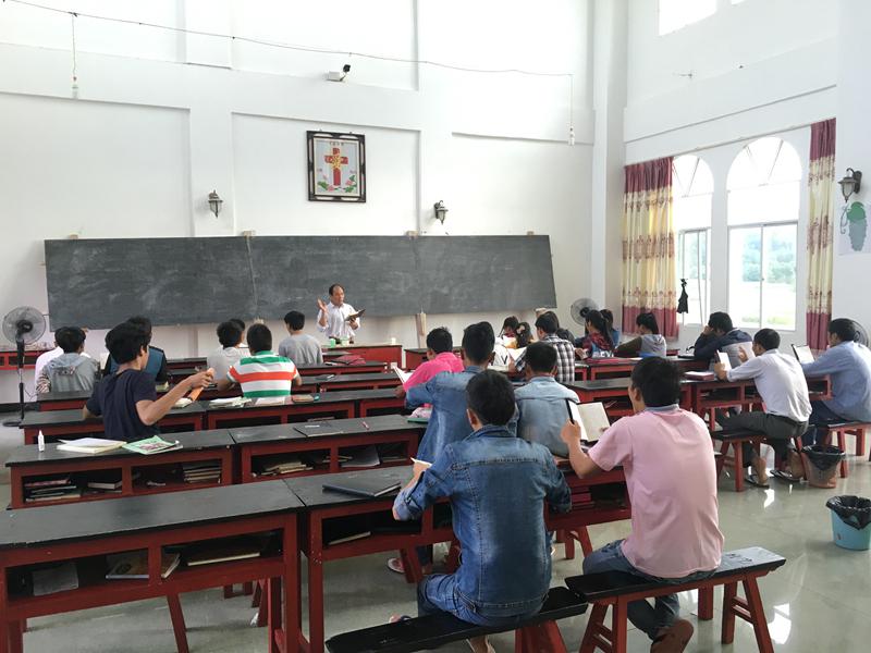 Students studying in the Longchuan Bible Training Center