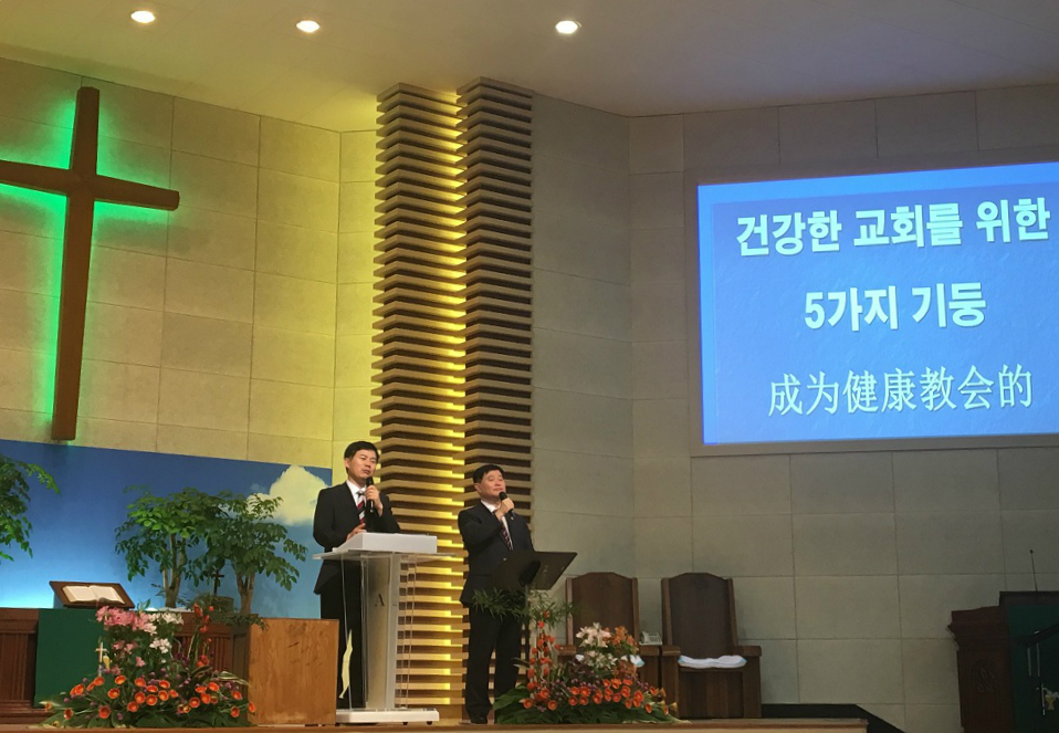 Rev.Sang-Cheol Sim delivers a sermon in the conference 