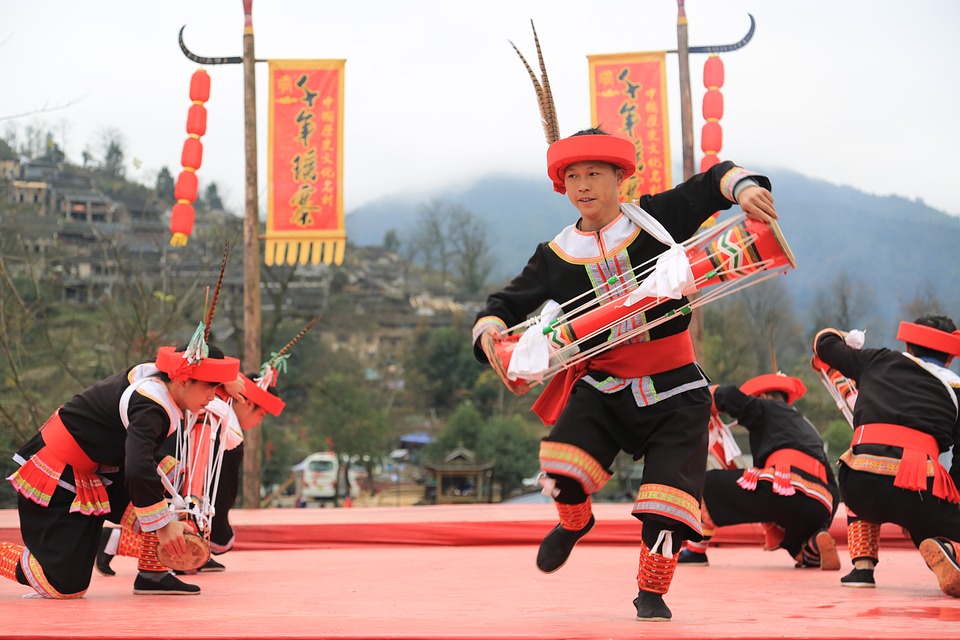 The Yao people perform a dance 