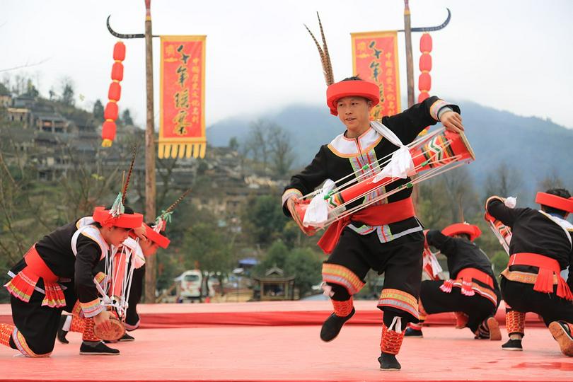 The Yao people perform a dance 