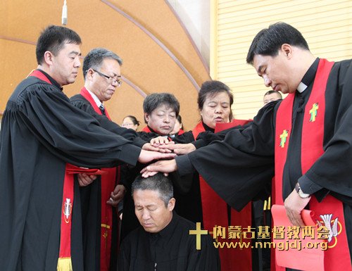 Pastors ordain an ordinand