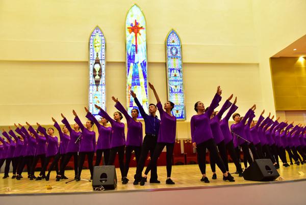 Young believers perfrom the dance "You, Crucified on the Cross" to celebrate the church dedication