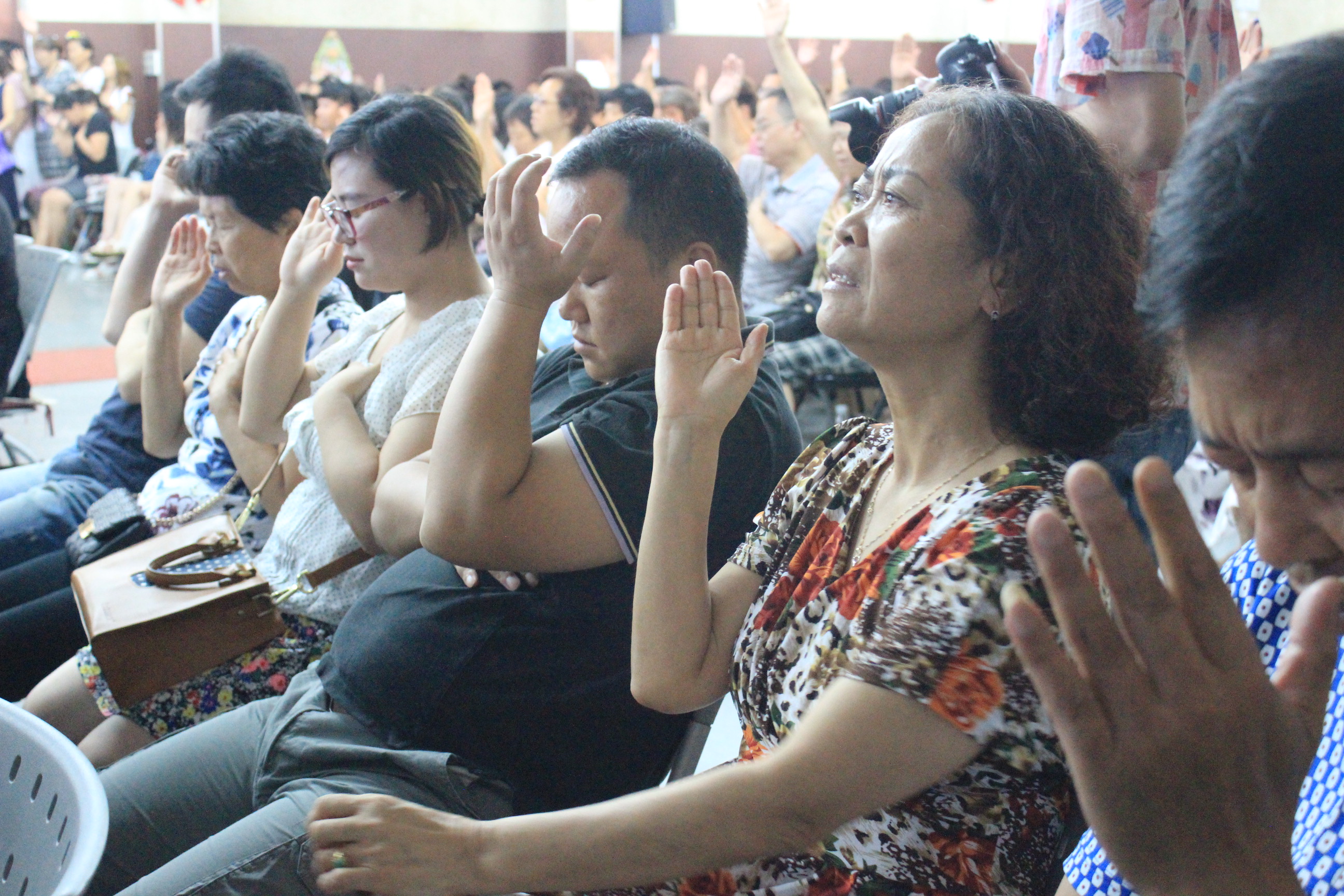 Believers worship in a church 