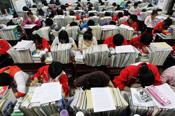 A group of Chinese students reviewing for the national college entrance exams or “gaokao.”