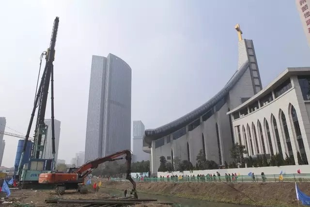 The construction site of the underground public parking garage of Chongyi Church when the groundbreaking ceremony was held on December 31, 2015