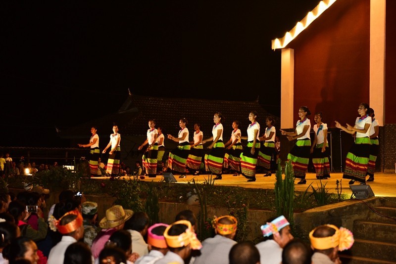 Thanksgiving day of Laku people Christian woman dancing and singing, praising God and giving thanks for the harvest.