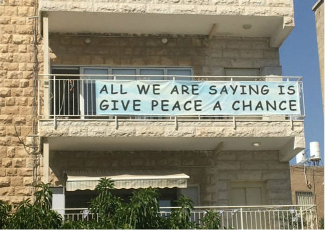 A banner hung on a peace center read, 