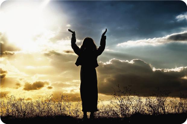 A woman worships God.