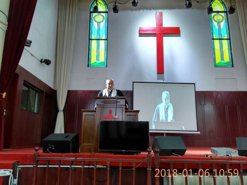 Rev. Yang Senlin presided over the Epiphany service on Jan. 6, 2018. 