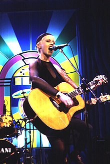 O'Riordan singing onstage at the height of their fame, 1995