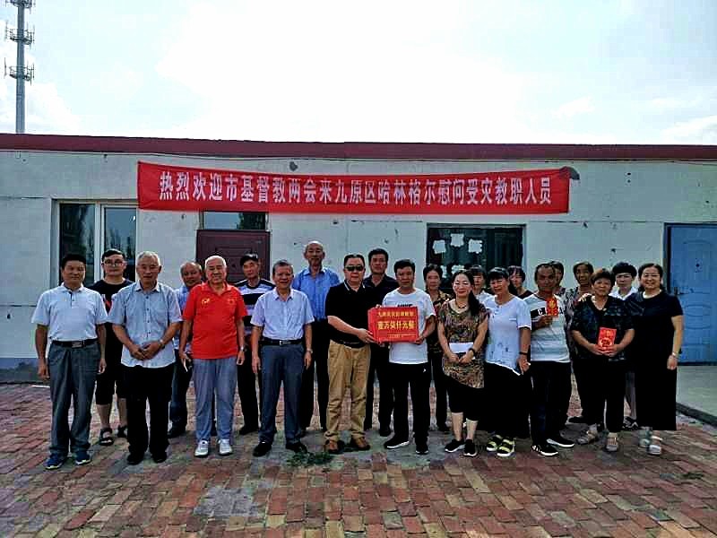 Group photo of the team of the Baotou CCC&TSPM and Christian victims