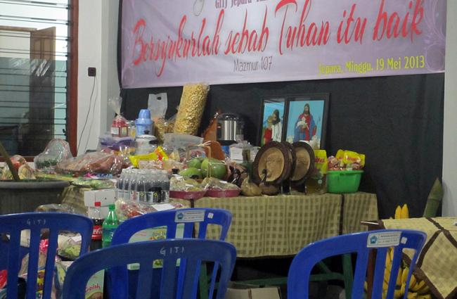 Lots of food were put on the table of a Javanese church in Indonesia, 2013. 