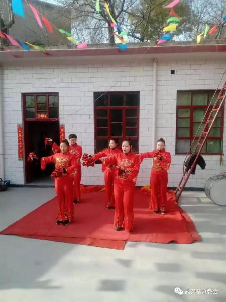 A local sacred music team performed dances before the new small church on Nov. 30, 2018.