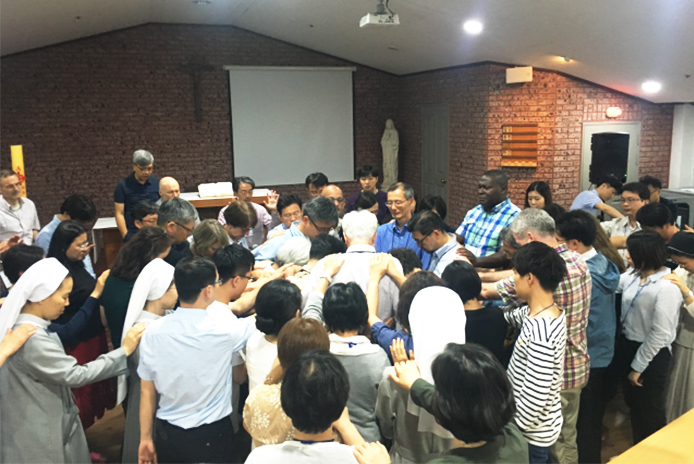 Participants at the sixth Annual Christian Forum for Reconciliation in Northeast Asia prayd together on May 31, 2019. 