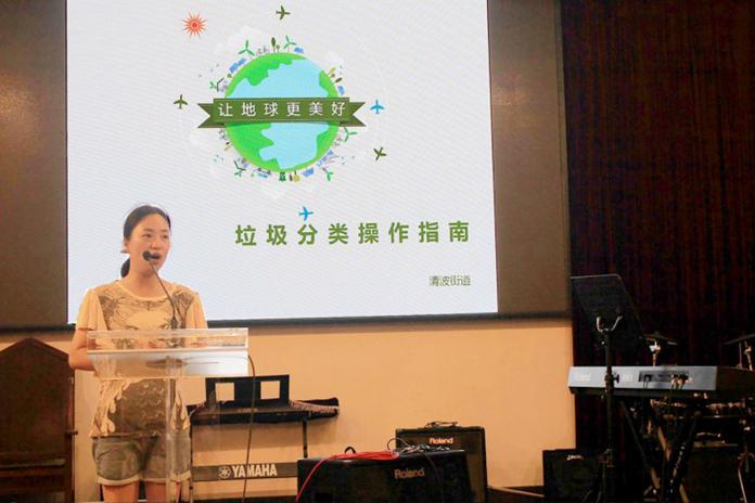 Hu Chenxia from a local community in Shangcheng District, Hangzhou gave a speech on garbage sorting in Gulou Church on July 25, 2019.