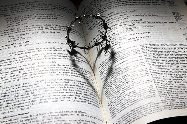 A thorny ring on the Bible 