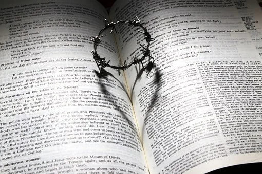 Passion Week: a thorny crown on the Bible. 