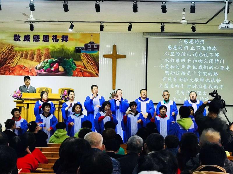 The choir of Shenyang Wanfang Church for the Deaf present a hymn in sign language in 2019.