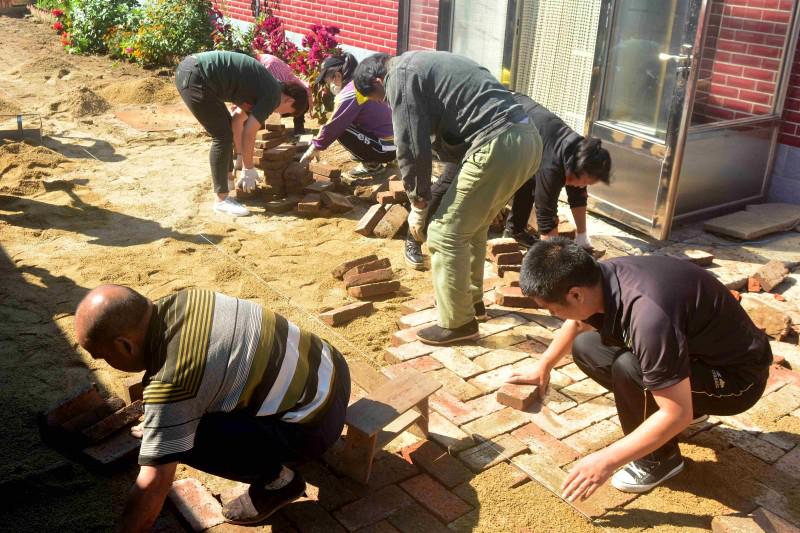 On September 18, 2020, about 20 believers repaired the ground inside Wangtai church in Haicheng City, in China’s northeastern Liaoning Province.