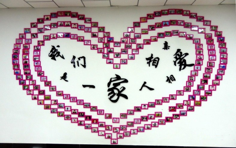 A large heart pattern made up of photos of believers on the wall of Nanzhan Church in Dongfeng County, Liaoyuan City, Jiin Province