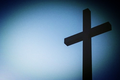 A cross in blue light