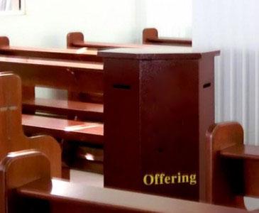 An offering box in a church. 