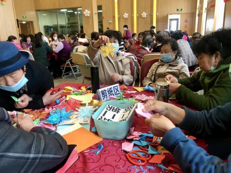 Female members of the elderly fellowship in Chuncheng Church, Changchun, Jilin, cut paper after service in mid May.