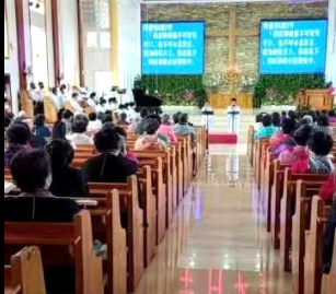 A church in the Lvshunkou district, Dalian City, Liaoning Province, held a Sunday service after reopening on May 30, 2021.  