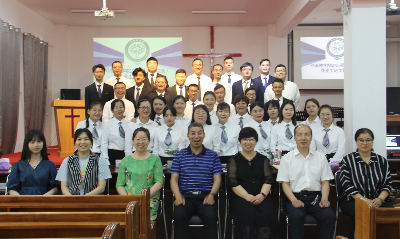 Graduates of Zhongnan Theological Seminary took a group picture with faculty on June 16, 2021.