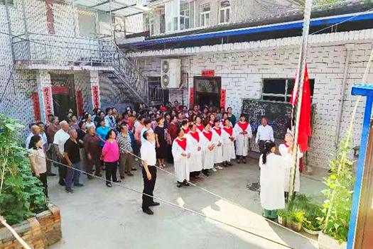 The congregation of Daning Church in Linfen, Shanxi Province, joined a national flag rising ceremony inside the church on June 27, 2021. 