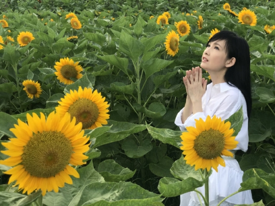 Christian actress Vivian Chow shot a video for her song of "Home in Heaven" in Xinxinyuan Farm, Hongkong, on June 29, 2021.