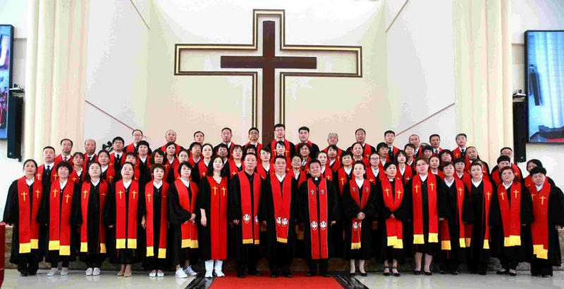 The ordained pastors took a group picture  in Panshi Church, Shenyang, Liaoning, on July 9, 2021.