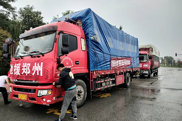 Two trucks loaded with relief supplies prepared for zhengzhou, Henan province, on July 21, 2021.