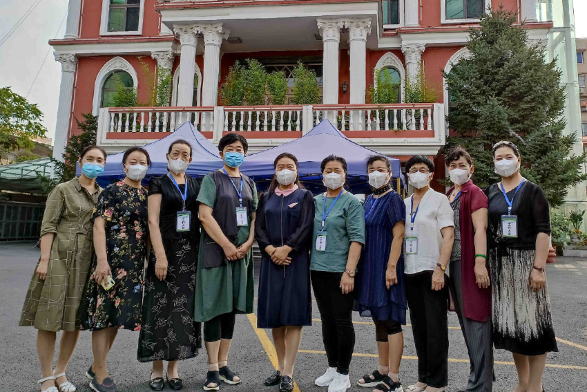 Female staff of Lvhua Street Church in Anshan, Liaoning took a group picture after the task of informing unaware believers about the suspension of gatherings on August 12, 2021.