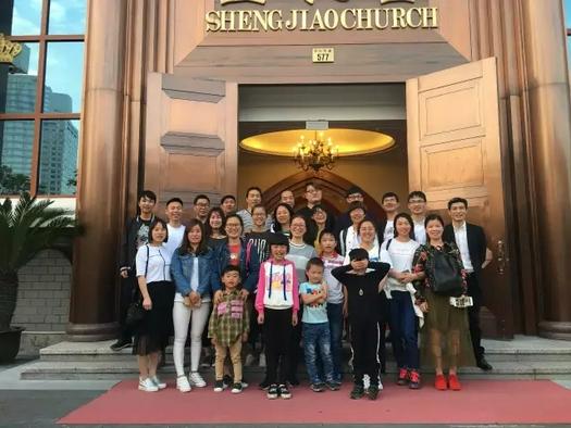 Some members of Holy Church and Songmen Church in Taizhou took a group picture in front of Holy Church in Ningbo, Zhejiang Province, bewteen April 29-30, 2021.