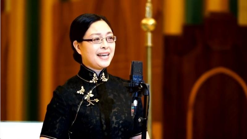 A woman sang a solo song in a Catholic concert called “Chinese Church Music Since the Tang Dynasty” held in the Church of the Savior in Beijing on October 16, 2021.