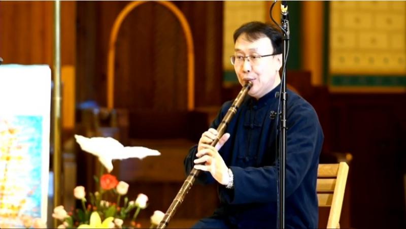 A man played the vertical flute in a Catholic concert called “Chinese Church Music Since the Tang Dynasty” held in the Church of the Savior in Beijing on October 16, 2021.