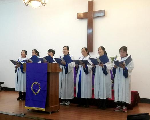The choir presented a hymn during a Sunday service held in HepuChurch, Beihai, Guangxi, on February 27, 2022. The church just reopened two days ago when the COVID-19 subsided.
