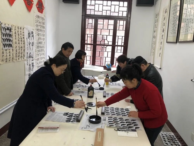Calligraphy enthusiasts practiced their handwriting in Chengbei Church, Changsha, Hu'nan, at an unknown day.