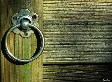 A closed door in old times.