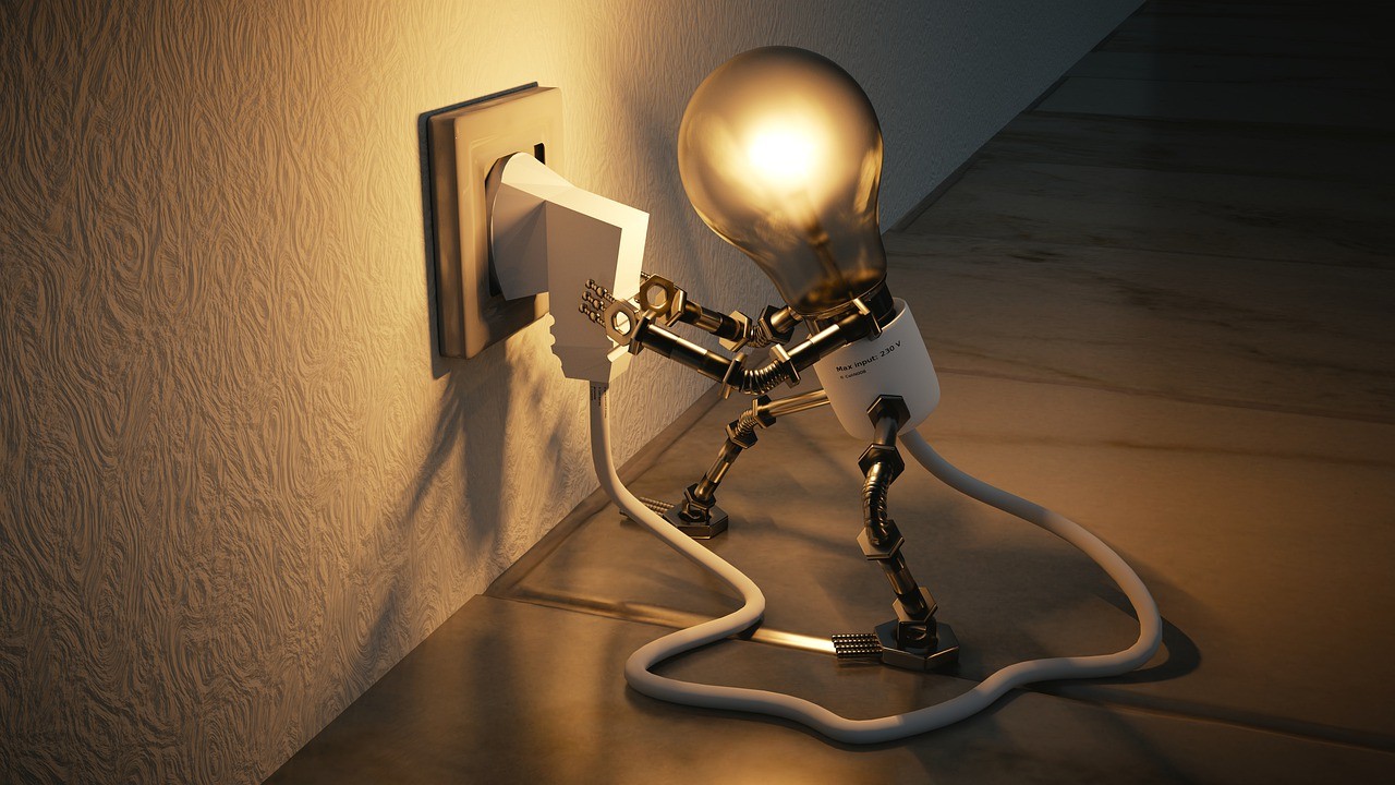 The picture shows taht a robot-like bulb holds the plug to charge.