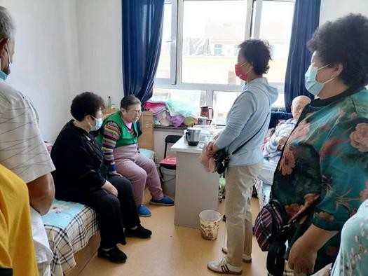 Pastoral staff of Shuishiying Church in Lushunkou District, Dalian, Liaoning, prayed for an aged female believer on June 2, 2022.