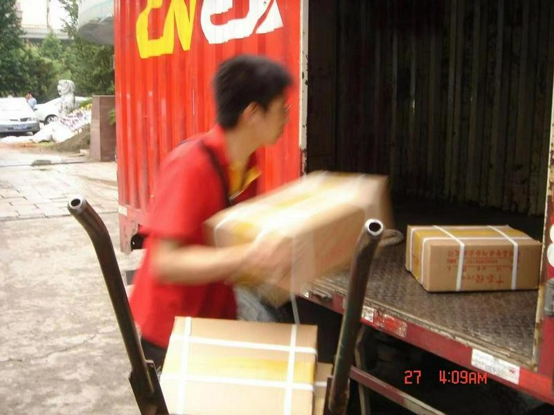 A picture shows a man loading relief supplies donated for the Sichuan Earthequake that occurred on May 12, 2008.