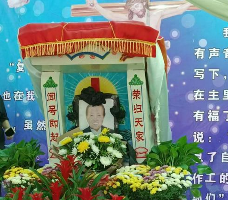 A deadee of a female believer named Liu Chang’e in her memorial service in Quwo County, Linfen, Shanxi, on June 16, 2022