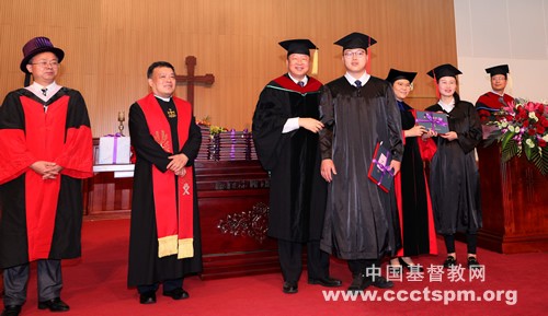 Pastors and graduates or postgraduates of Nanjing Union Theological Seminary in Jiangsu took a picture after the commencement ceremony held on June 25, 2022.