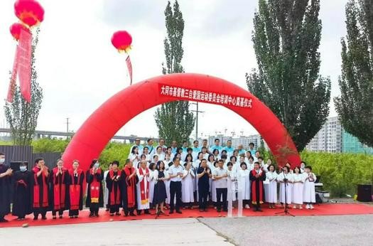 The choir, pastors, and government officials took a group picture during a groundbreaking ceremony for a Christian training center affiliated with Datong TSPM in Shanxi on June 28, 2022.