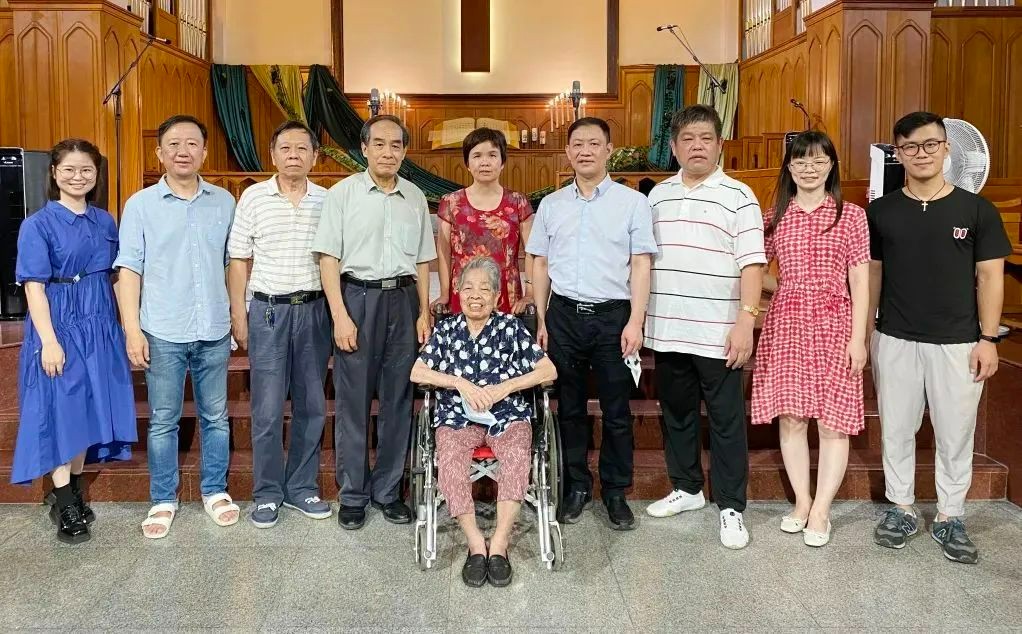 The senior and members of Savior Church in Guangzhou, Guangdong, took a group picture during an activity of honoring the elderly and celebrating the Mid-Autumn Day in late August 2022.