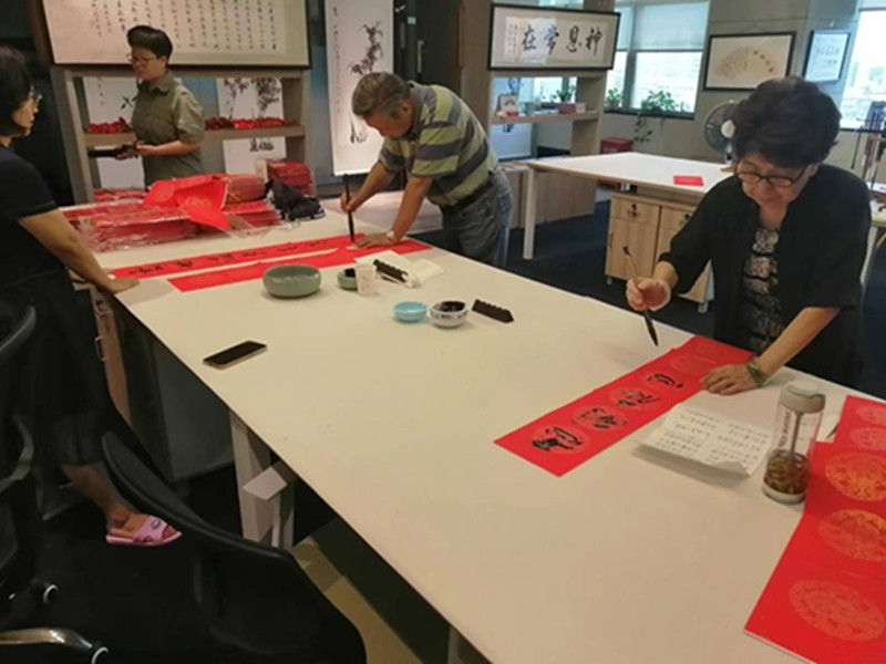 Two believers wrote Chinese calligraphy at an unknown date in Wuyi Culture and Art Service Center established by Flower Lane Church, in Fuzhou, Fujian, in June 2022