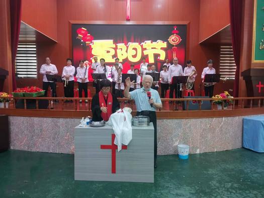 Elder Yuan Xiangzhong, aged 92, offered a prayer of benediction after a Sunday service to honor the elderly with a communion service in True God Church, Fenghua District, Ningbo, Zhejiang, on October 2, 2022.
